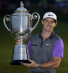 Rory with another great big trophy.